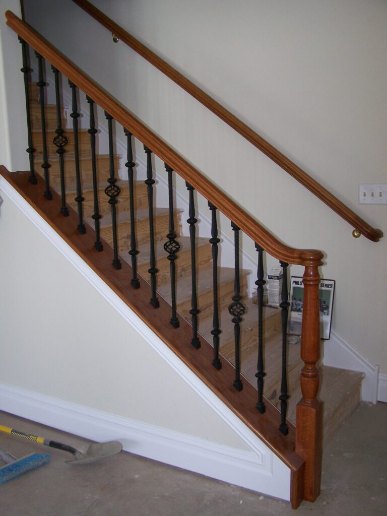 Traditional circular staircase in Bucks County, PA: Traditional circular staircase with iron balustrade, photo 1 of 13