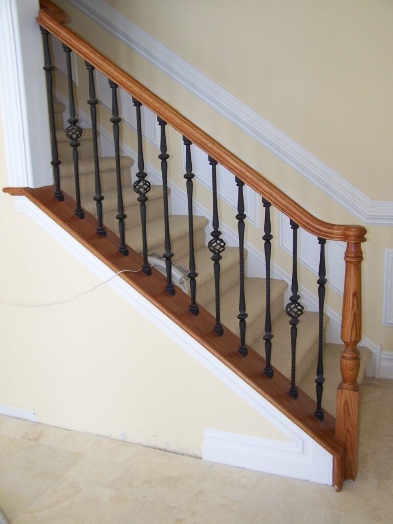 Traditional circular staircase in Bucks County, PA: Traditional circular staircase with iron balustrade, photo 2 of 13