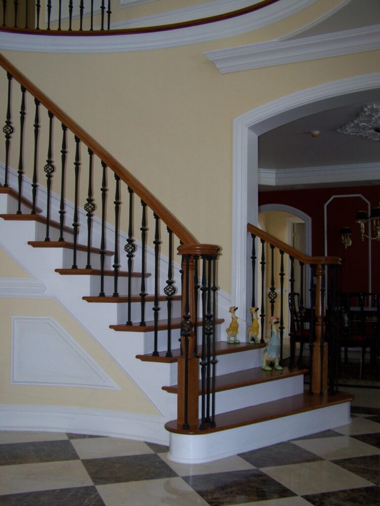 Traditional circular staircase in Bucks County, PA: Traditional circular staircase with iron balustrade, photo 4 of 13