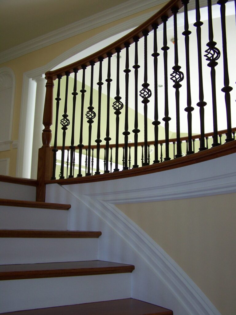 Traditional circular staircase in Bucks County, PA: Traditional circular staircase with iron balustrade, photo 5 of 13