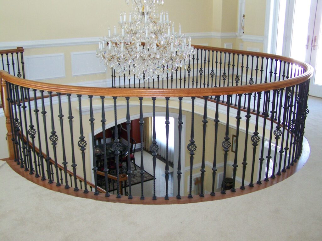 Traditional circular staircase in Bucks County, PA: Traditional circular staircase with iron balustrade, photo 6 of 13