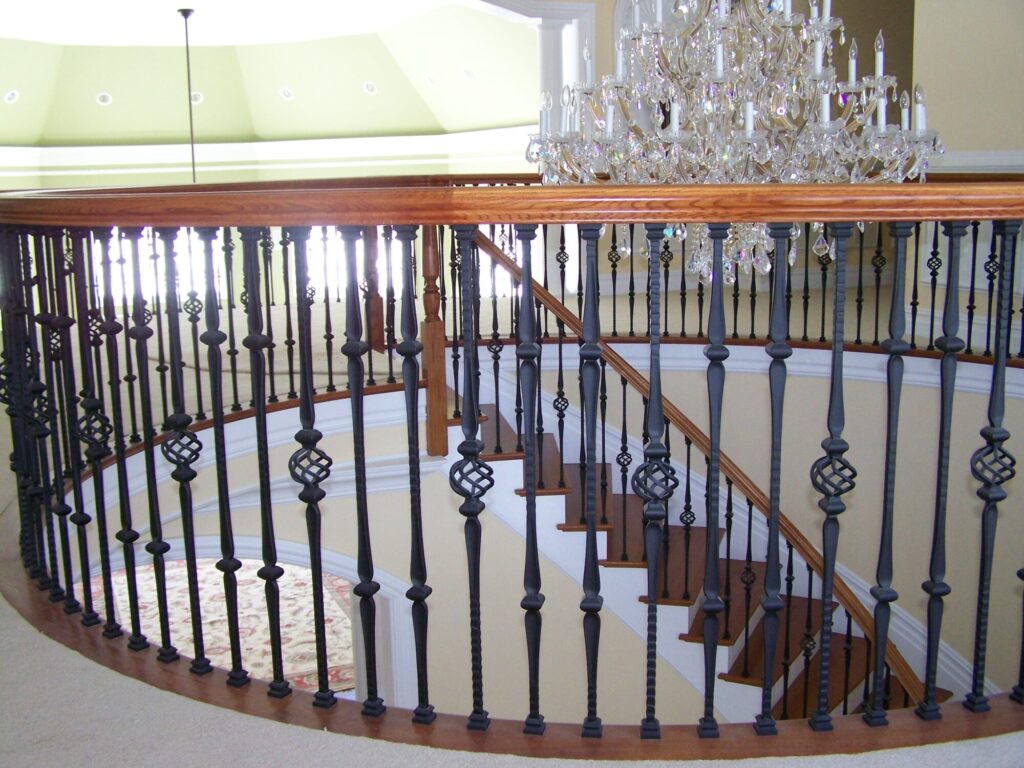 Traditional circular staircase in Bucks County, PA: Traditional circular staircase with iron balustrade, photo 7 of 13