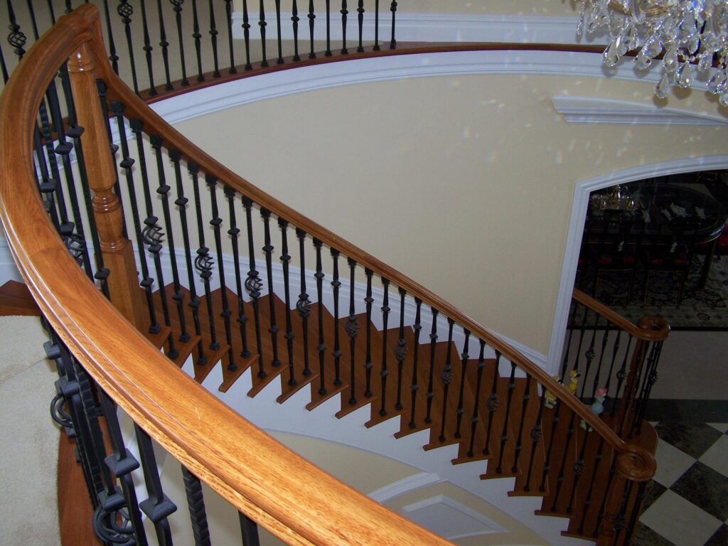 Traditional circular staircase in Bucks County, PA: Traditional circular staircase with iron balustrade, photo 9 of 13