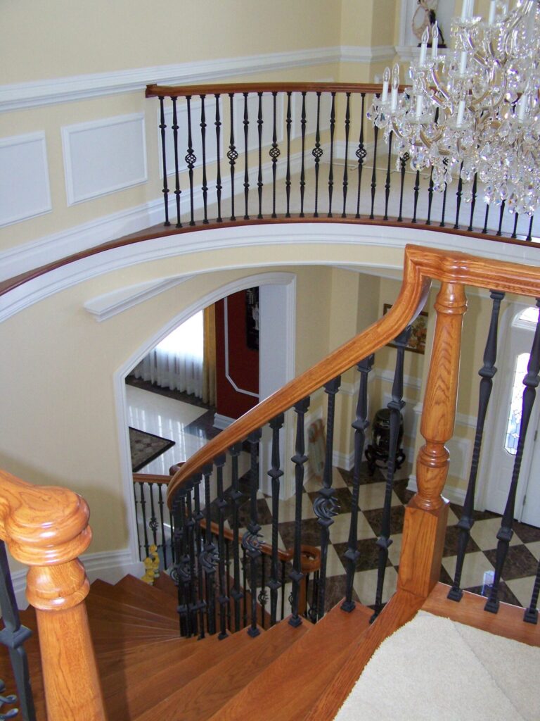 Traditional circular staircase in Bucks County, PA: Traditional circular staircase with iron balustrade, photo 10 of 13
