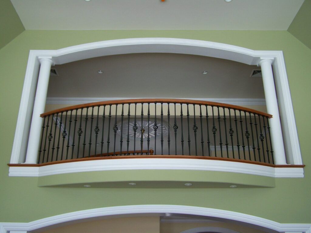 Traditional circular staircase in Bucks County, PA: Traditional circular staircase with iron balustrade, photo 13 of 13