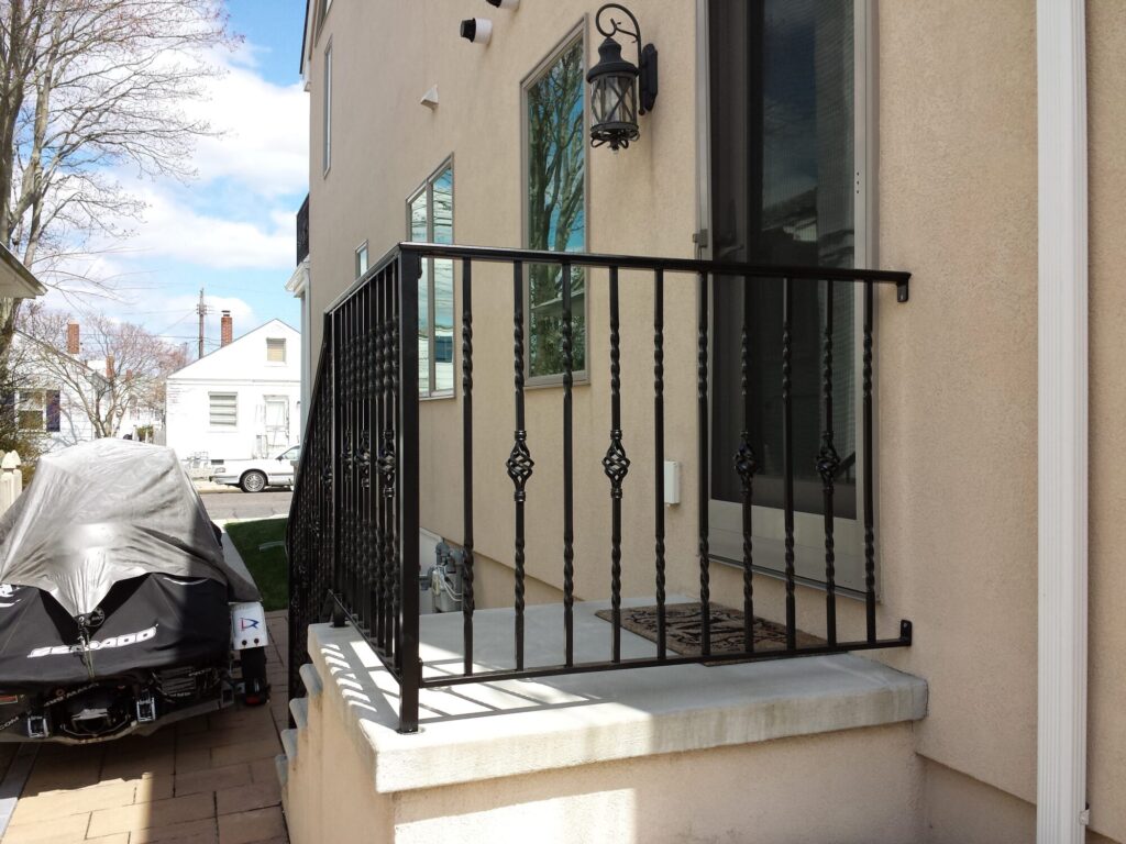 Traditional custom ornamental aluminum rail at the beach, photo 1 of 8