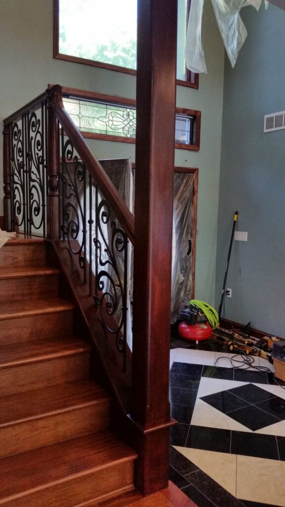 Traditional iron scroll infill with wood newel and handrails, photo 2 of 14