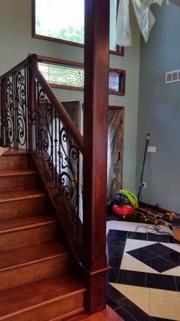 Traditional iron scroll infill with wood newel and handrails, photo 3 of 14
