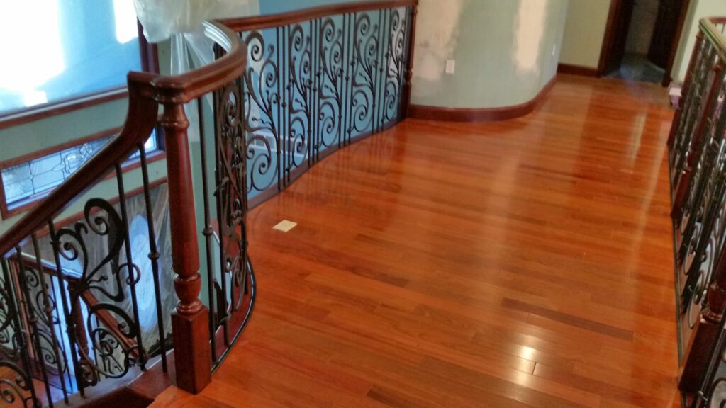 Traditional iron scroll infill with wood newel and handrails, photo 7 of 14