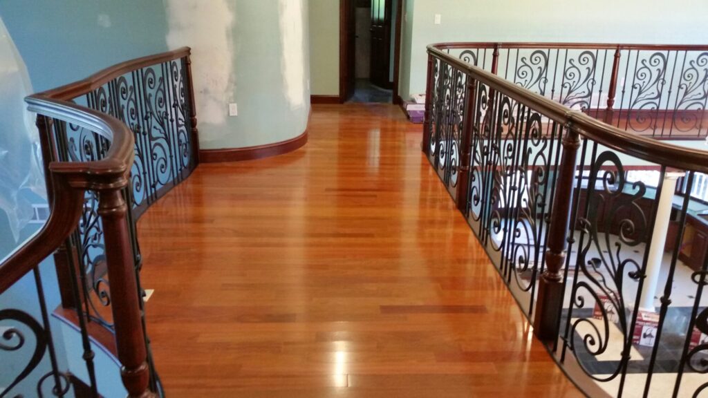 Traditional iron scroll infill with wood newel and handrails, photo 8 of 14