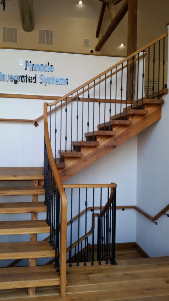 Rustic modern staircase with thick treads and hammered iron balusters: White oak treads with open risers, photo 3 of 10