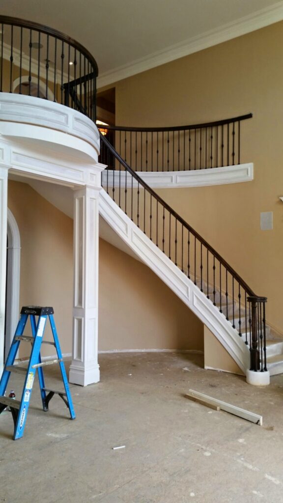 Mirroring circular staircase with closed stringer and raised panels, photo 4 of 8