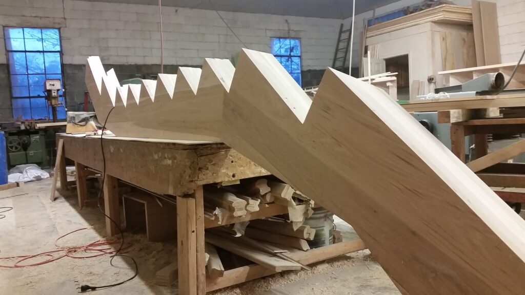 Solid hickory center stringer stair with hammered iron balusters. Carversville PA, photo 2 of 9