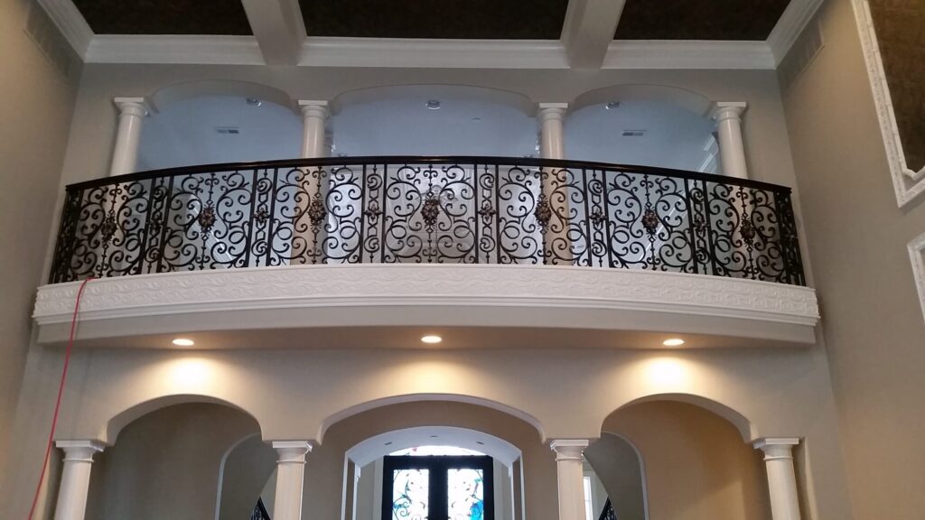 Custom mirroring circular stair with firenza scroll work, photo 1 of 10