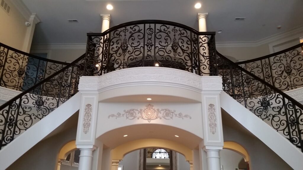 Custom mirroring circular stair with firenza scroll work, photo 6 of 10