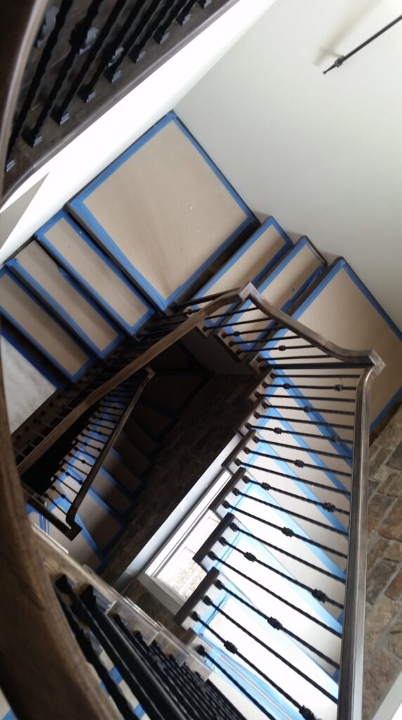 Solid hickory center stringer stair with hammered iron balusters. Carversville PA, photo 5 of 9