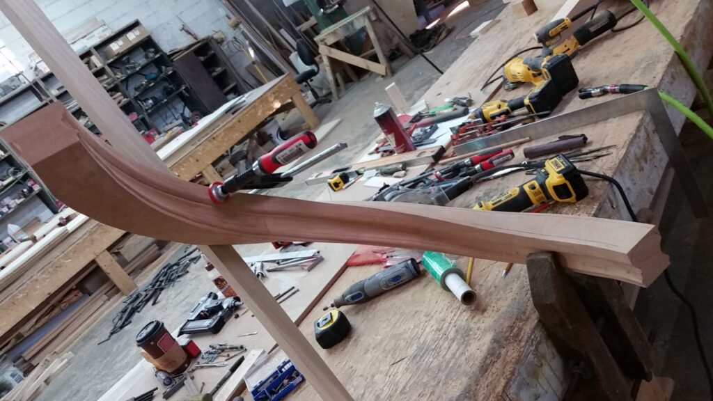 Custom hand carved tangent rails with closed stringer, photo 16 of 27