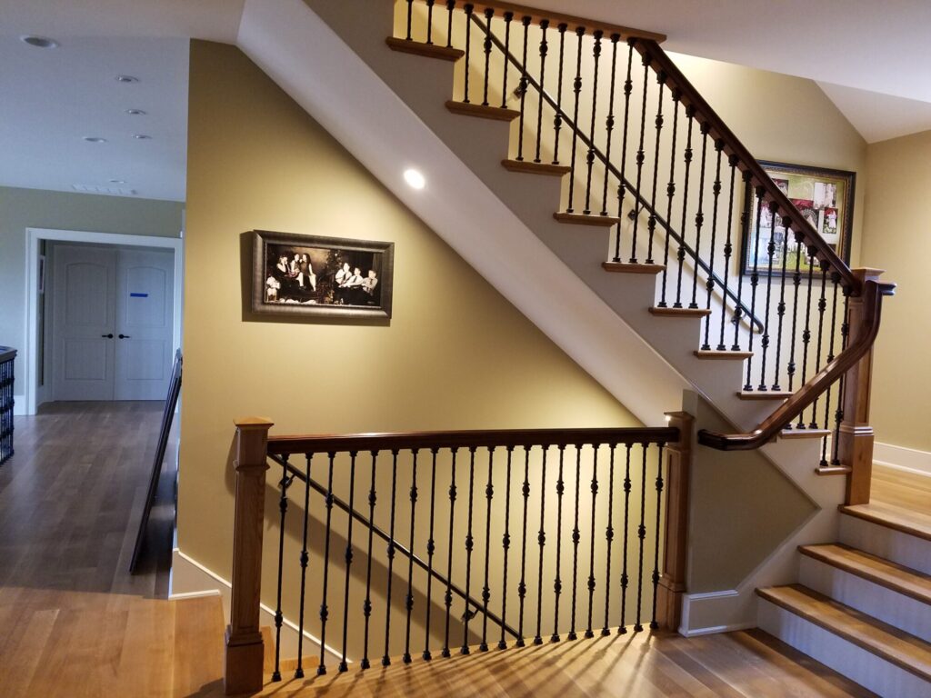 White oak and walnut staircase with custom box newel, photo 1 of 19