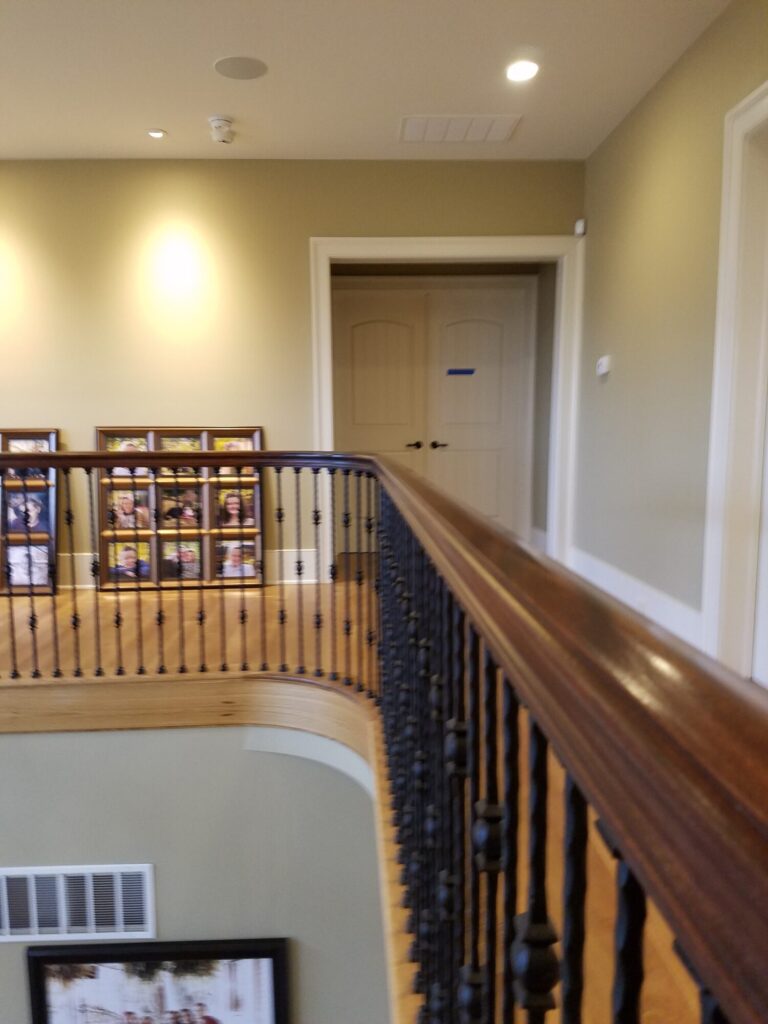 White oak and walnut staircase with custom box newel, photo 2 of 19