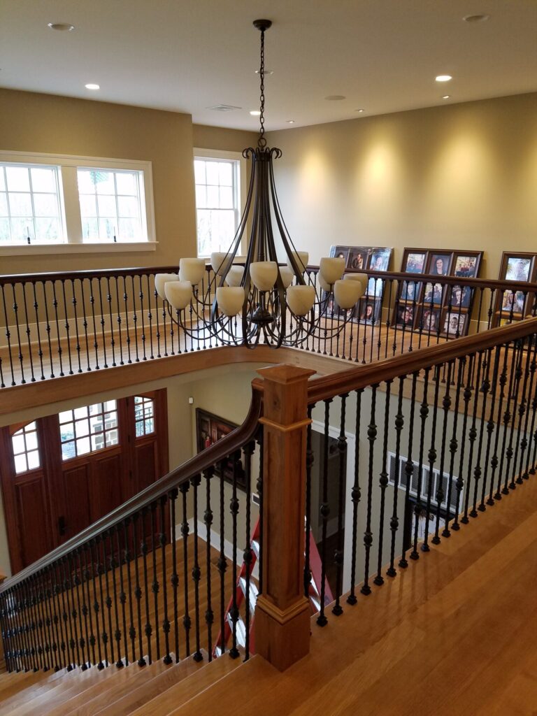 White oak and walnut staircase with custom box newel, photo 4 of 19