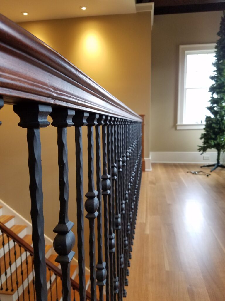 White oak and walnut staircase with custom box newel, photo 6 of 19