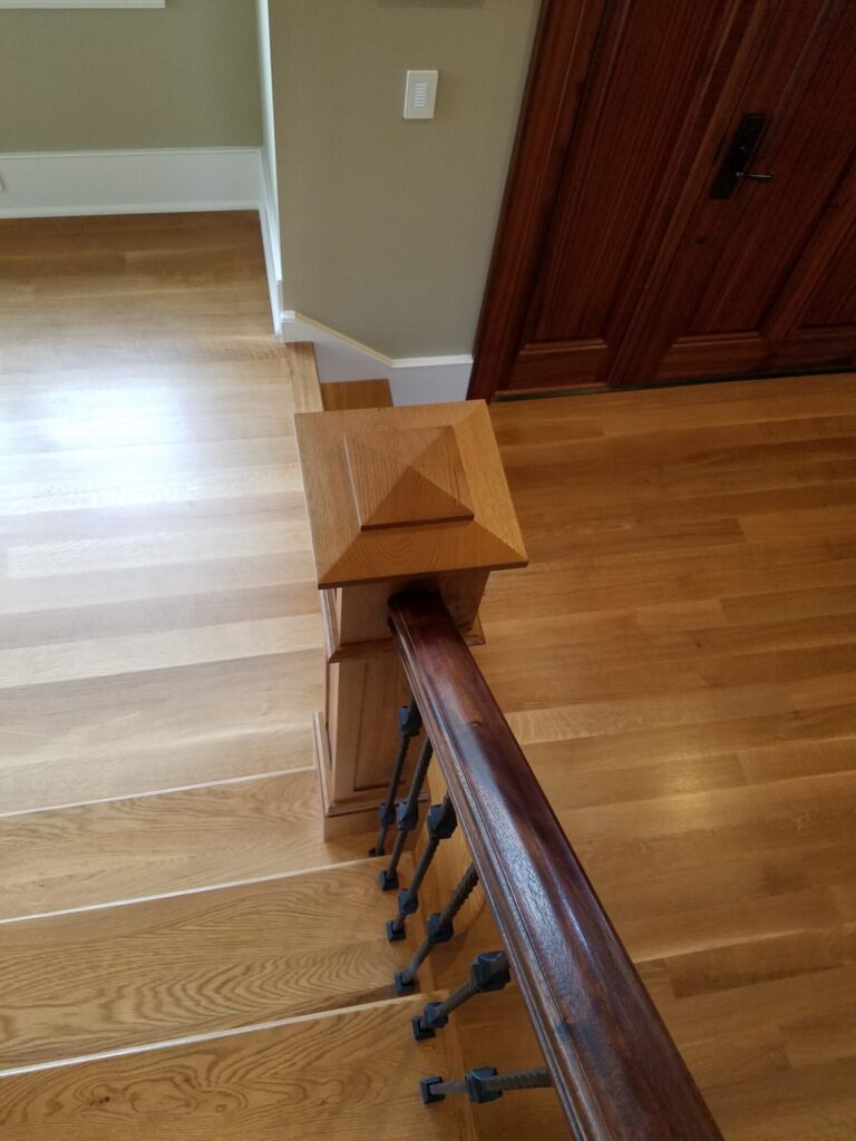White oak and walnut staircase with custom box newel, photo 7 of 19