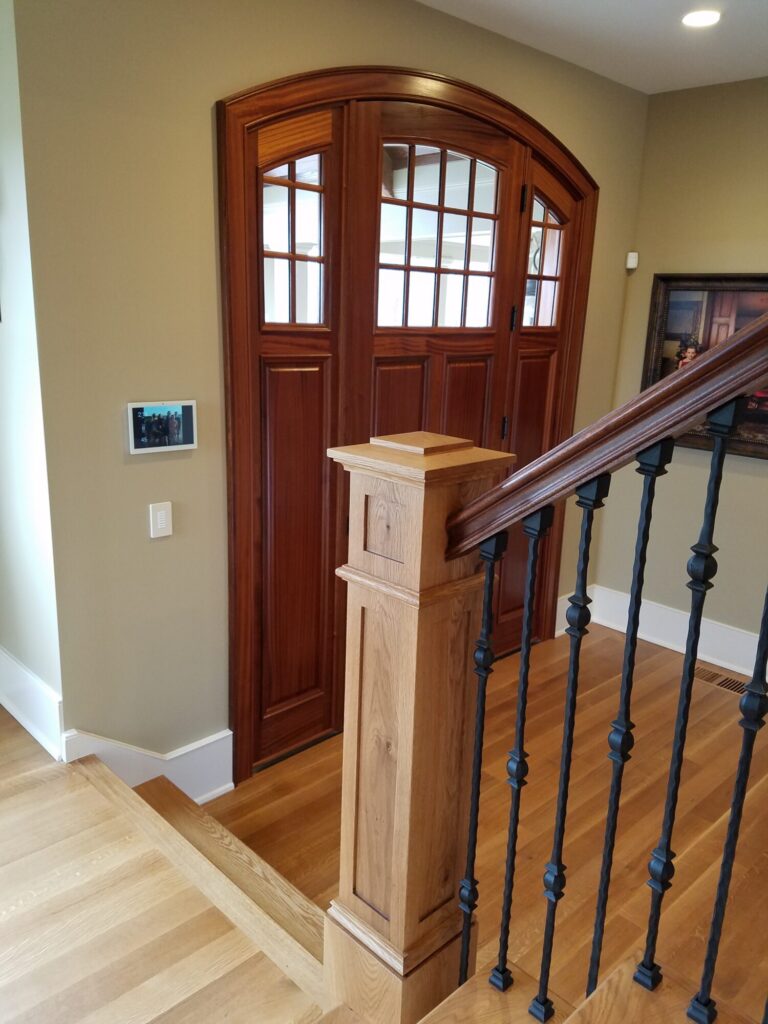 White oak and walnut staircase with custom box newel, photo 8 of 19