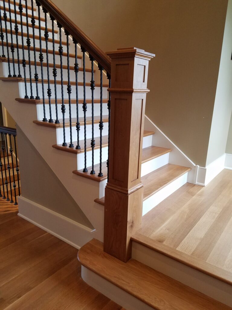 White oak and walnut staircase with custom box newel, photo 10 of 19