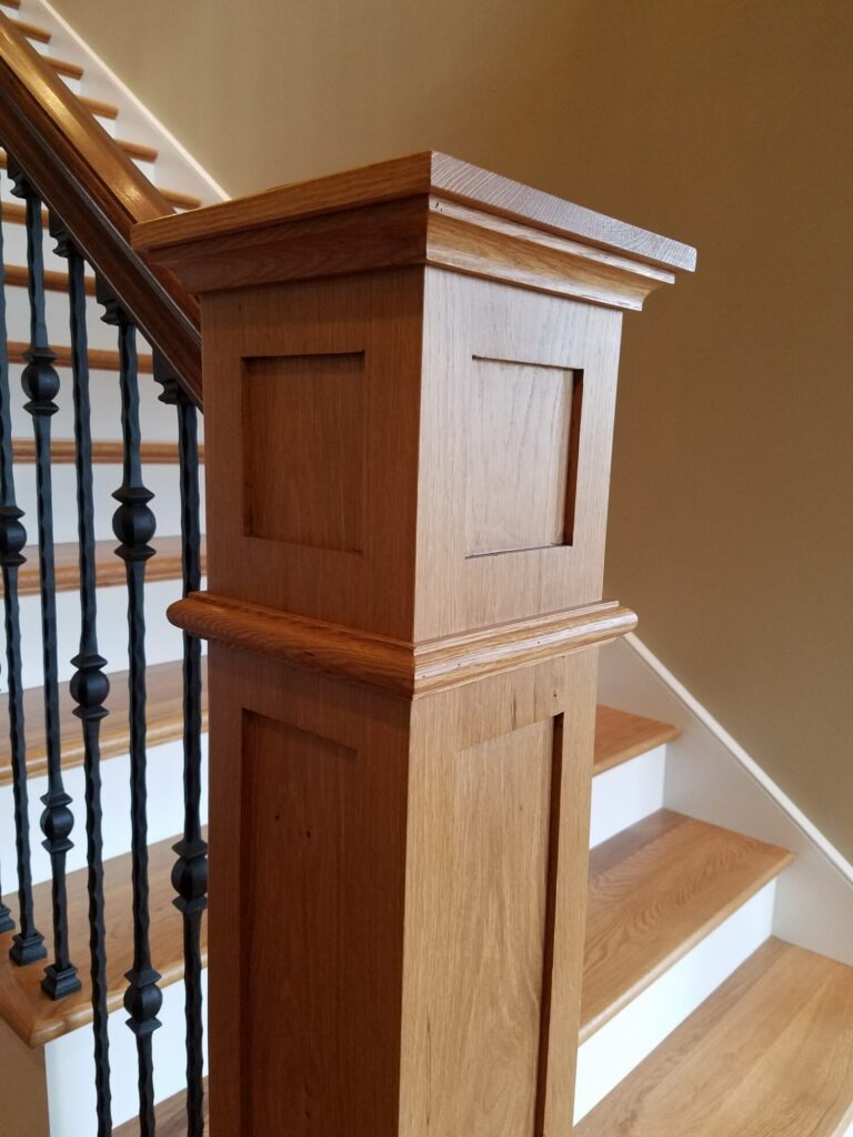 White oak and walnut staircase with custom box newel, photo 11 of 19