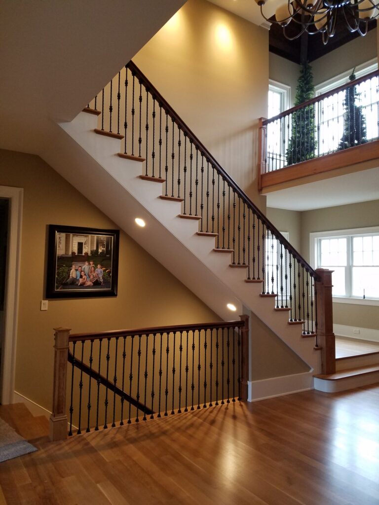 White oak and walnut staircase with custom box newel, photo 15 of 19