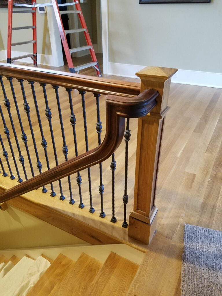 White oak and walnut staircase with custom box newel, photo 16 of 19