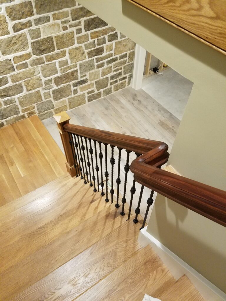 White oak and walnut staircase with custom box newel, photo 17 of 19