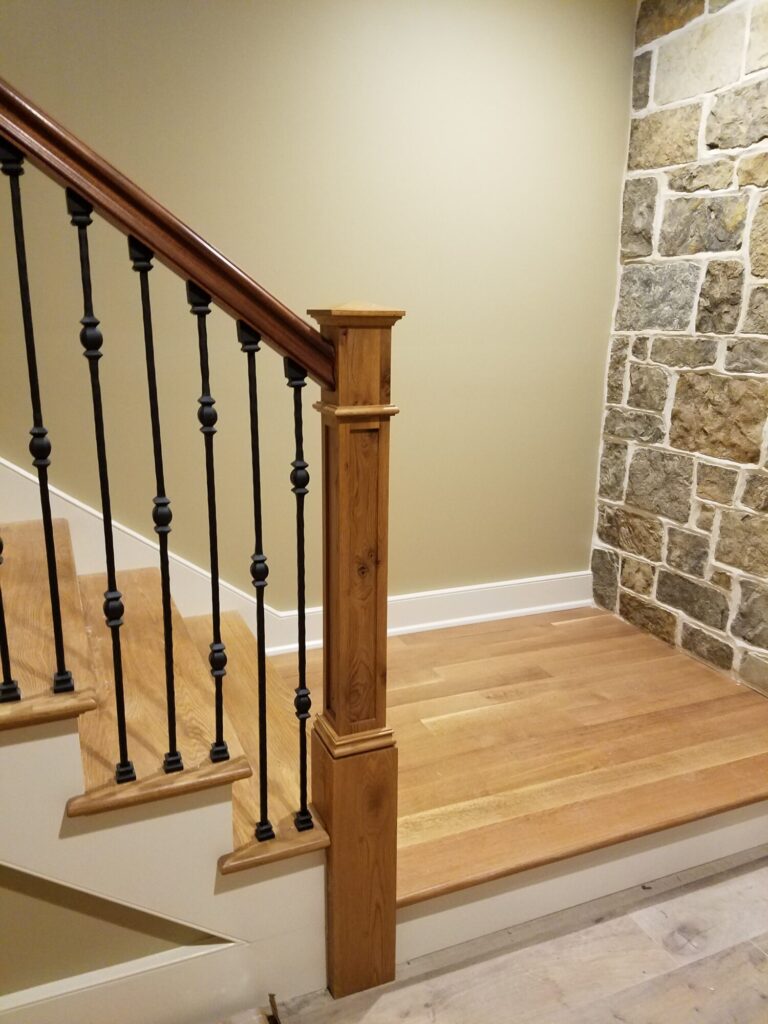 White oak and walnut staircase with custom box newel, photo 18 of 19