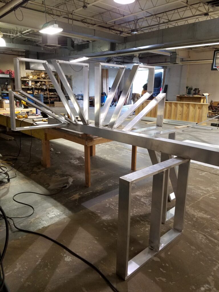 Aluminum square spiral in white with ipe treads and cable rail: Ocean City NJ, photo 9 of 11