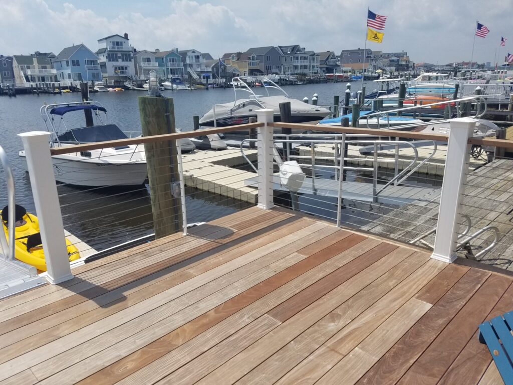Aluminum square spiral in white with ipe treads and cable rail: Ocean City NJ, photo 7 of 11
