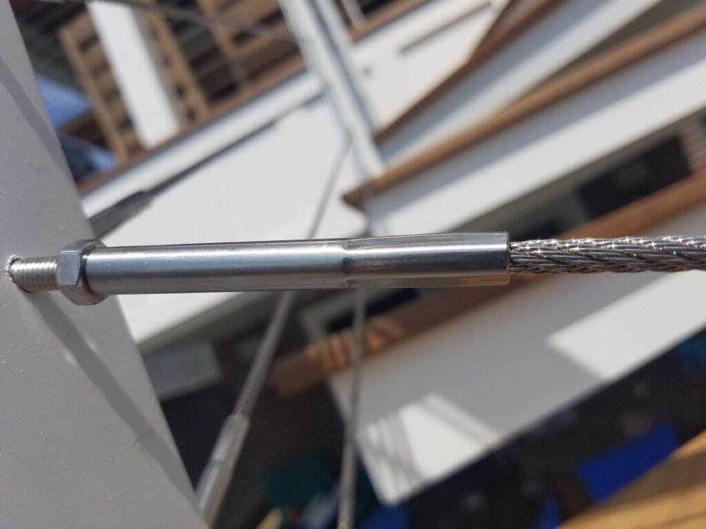 Aluminum square spiral in white with ipe treads and cable rail: Ocean City NJ, photo 11 of 11