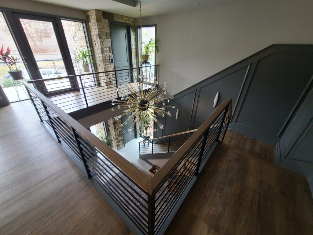 Horizontal design in New Hope, PA: Modern wood top rail with round powder coated metal horizontal bar infill, photo 4 of 6
