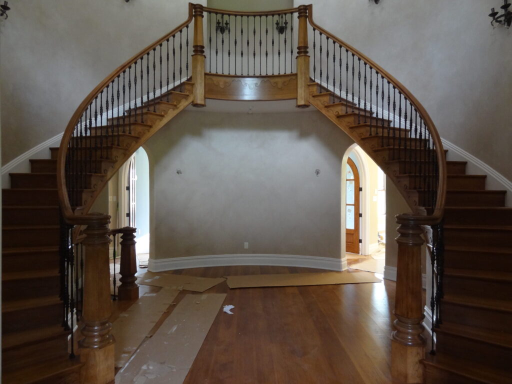 Mirroring curved staircase with iron balusters custom made hexagonal box newel: Solid hickory treads, risers and handrail, photo 5 of 15