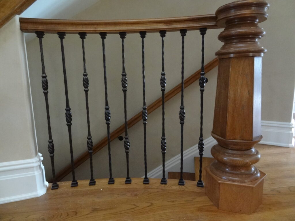 Mirroring curved staircase with iron balusters custom made hexagonal box newel: Solid hickory treads, risers and handrail, photo 10 of 15