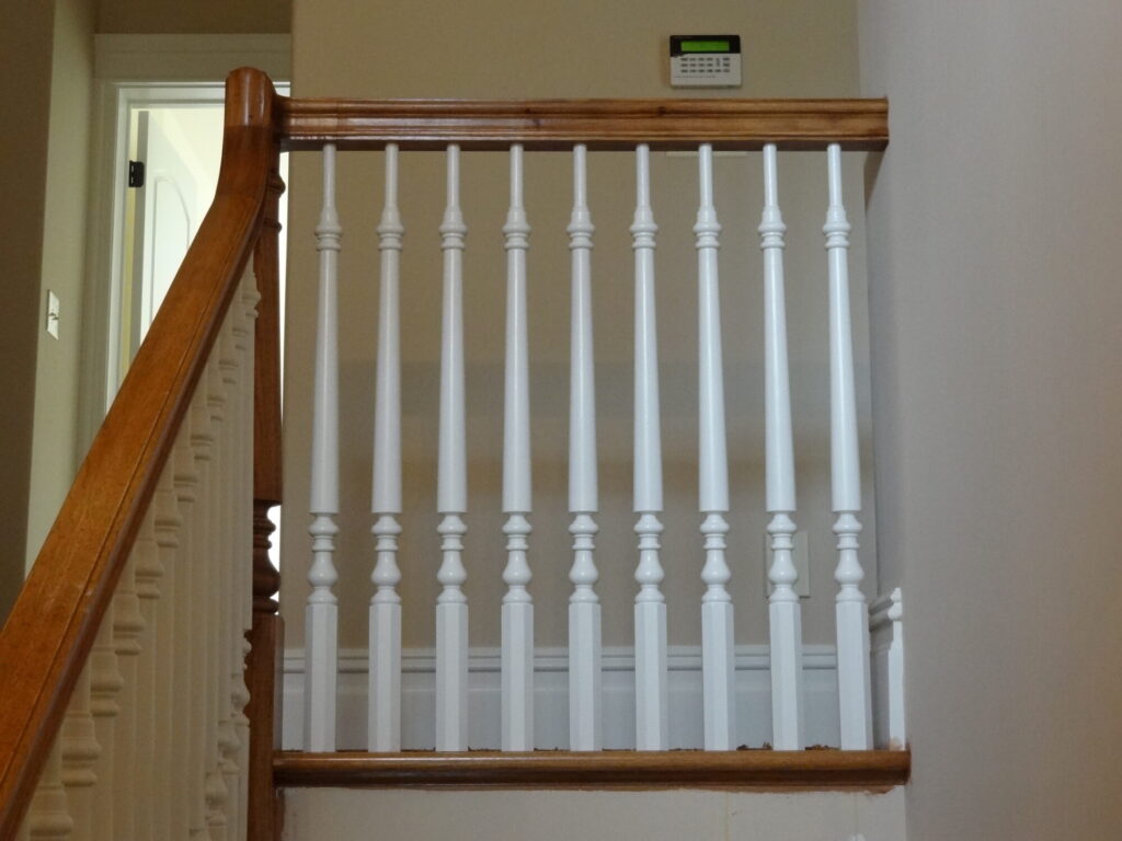 Mirroring curved staircase with iron balusters custom made hexagonal box newel: Solid hickory treads, risers and handrail, photo 12 of 15