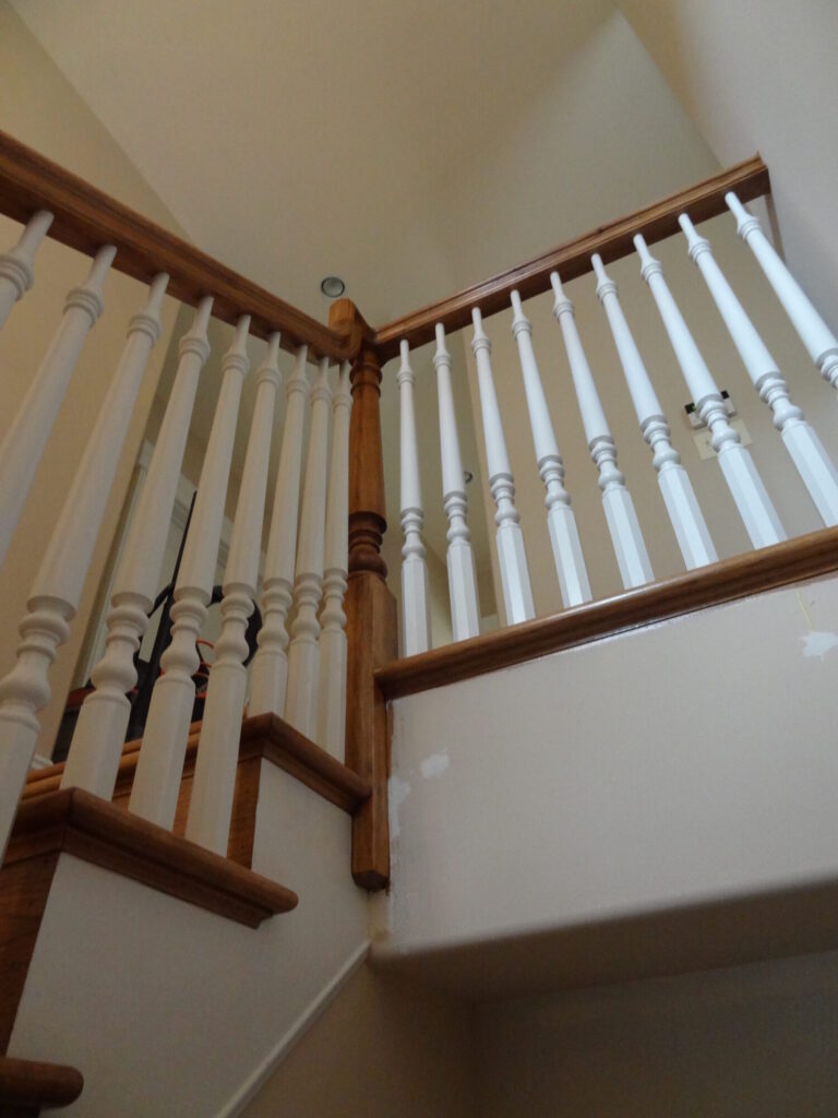 Mirroring curved staircase with iron balusters custom made hexagonal box newel: Solid hickory treads, risers and handrail, photo 15 of 15