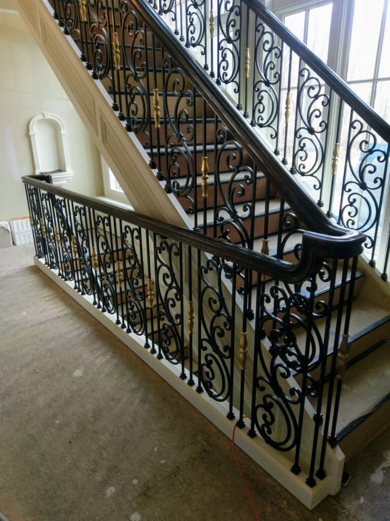 Tuscany wrought iron panels with curb stringer stair, photo 13 of 14