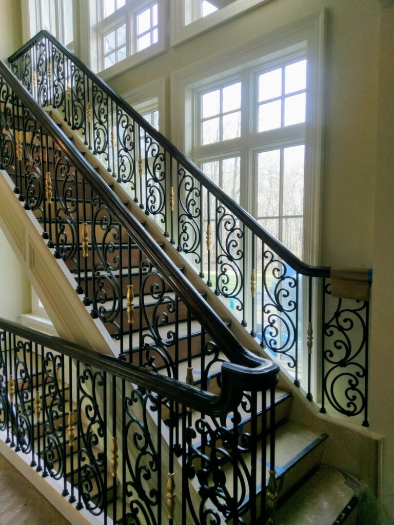Tuscany wrought iron panels with curb stringer stair, photo 12 of 14