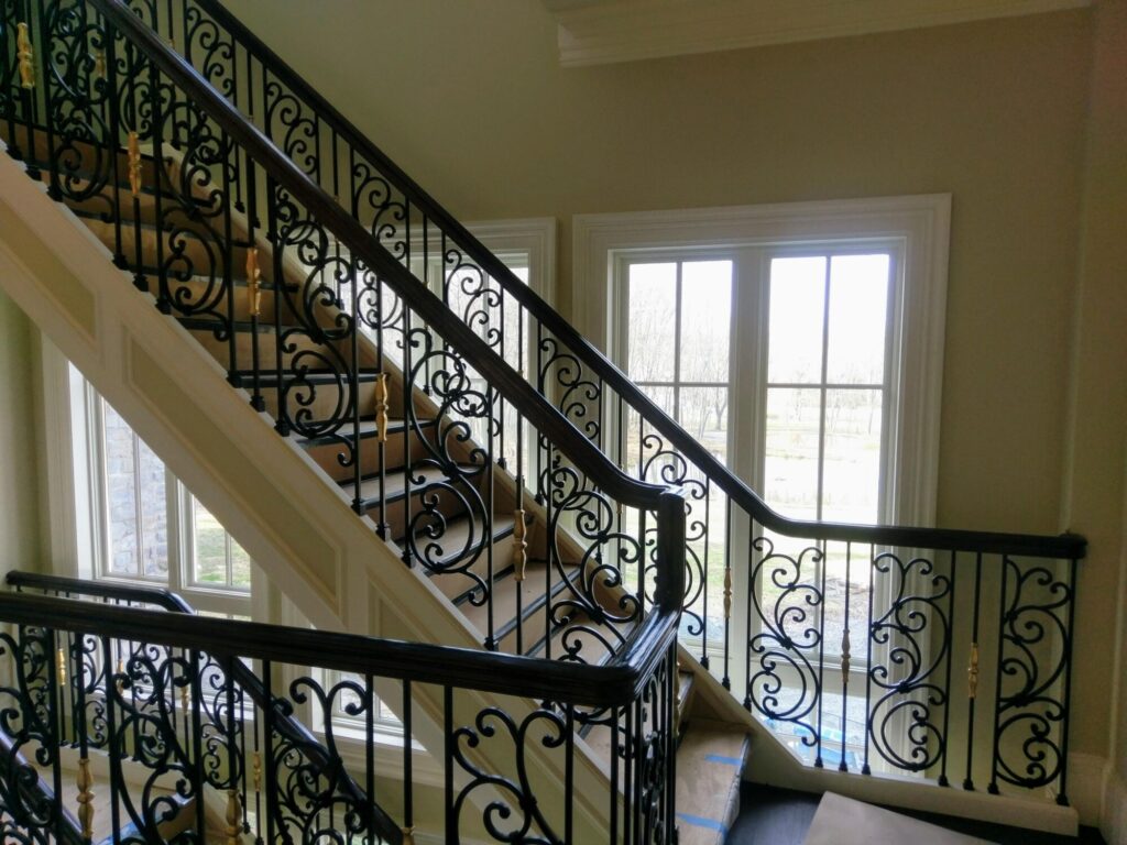 Tuscany wrought iron panels with curb stringer stair, photo 8 of 14