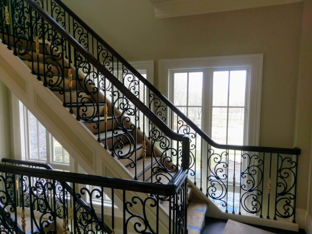Tuscany wrought iron panels with curb stringer stair, photo 7 of 14