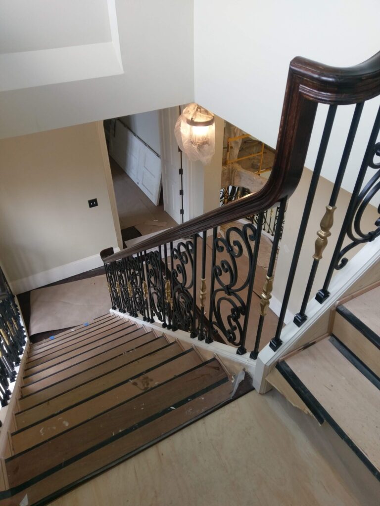 Tuscany wrought iron panels with curb stringer stair, photo 3 of 14