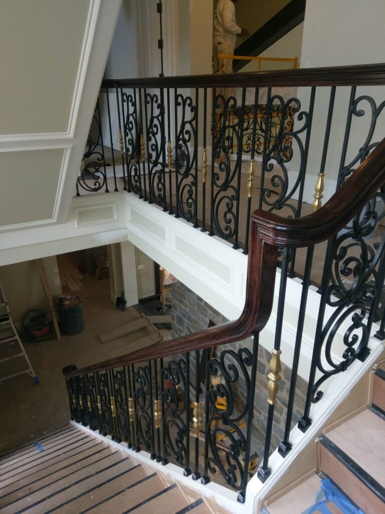 Tuscany wrought iron panels with curb stringer stair, photo 2 of 14
